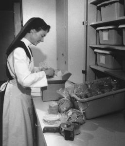 Sister Vicki in the 1980s preparing an order for shipment